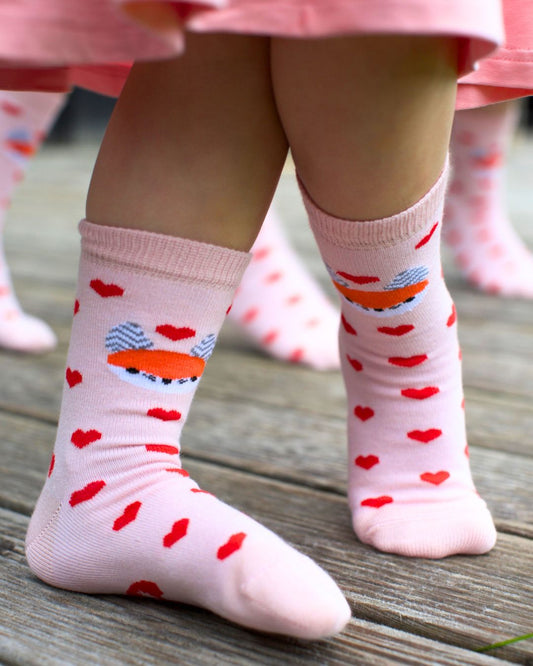 Gaiši rozā zeķītes ar sirsniņām